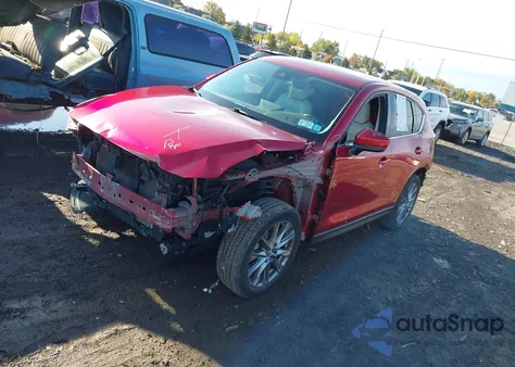 2021 Mazda Cx-5 Grand Touring z USA, uszkodzony, nr VIN JM3KFBDM6M1312394